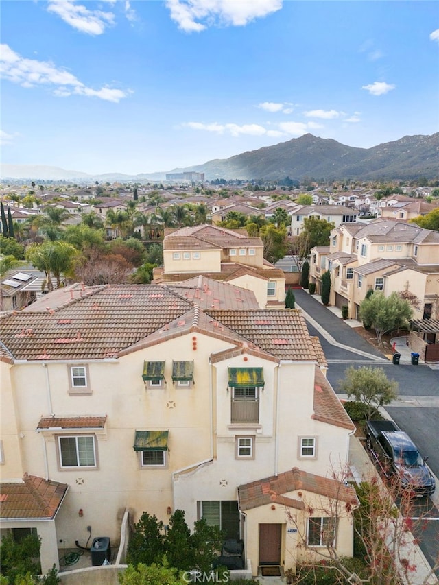 drone / aerial view featuring a mountain view