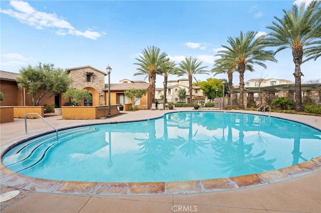 view of swimming pool featuring a patio