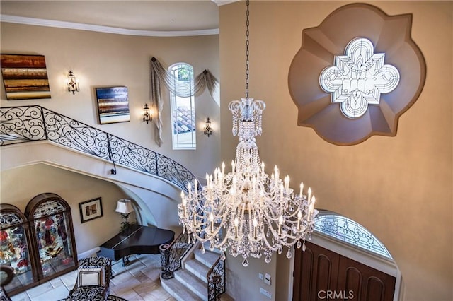 6 Inspiration, Laguna Niguel, CA 92677 - stairway with a chandelier, crown molding, and a high ceiling