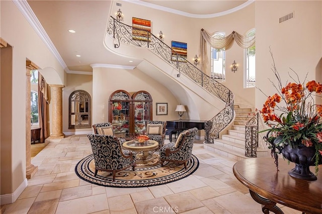 6 Inspiration, Laguna Niguel, CA 92677 - foyer with ornate columns, stone tile floors, stairway, baseboards, and a towering ceiling