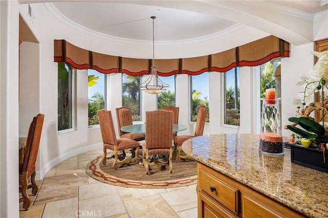 6 Inspiration, Laguna Niguel, CA 92677 - dining room with crown molding, stone tile floors, baseboards, and arched walkways