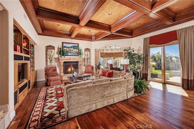 6 Inspiration, Laguna Niguel, CA 92677 - living area featuring a lit fireplace, hardwood / wood-style flooring, coffered ceiling, crown molding, and beam ceiling