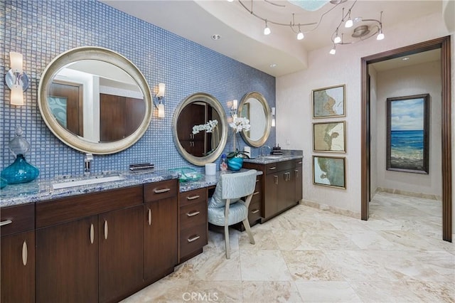 6 Inspiration, Laguna Niguel, CA 92677 - bathroom featuring two vanities and baseboards