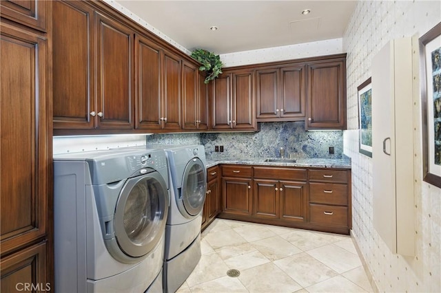 6 Inspiration, Laguna Niguel, CA 92677 - washroom featuring washing machine and clothes dryer, cabinet space, light tile patterned flooring, and wallpapered walls