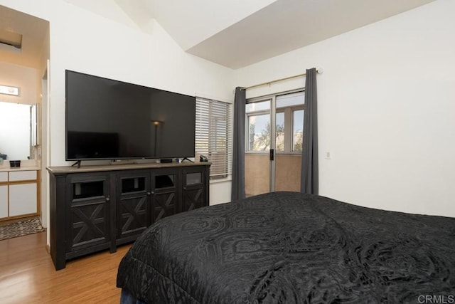 bedroom with light wood-type flooring