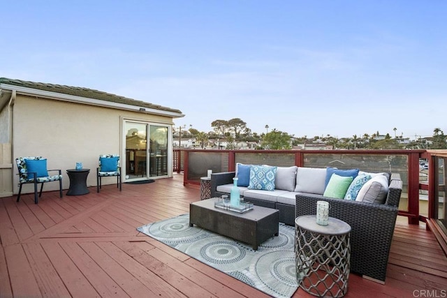 wooden deck featuring an outdoor hangout area