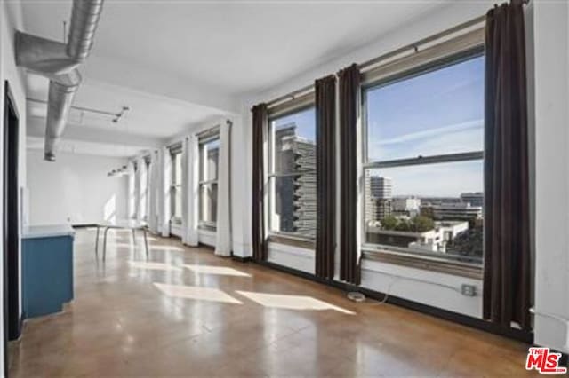 interior space featuring concrete flooring