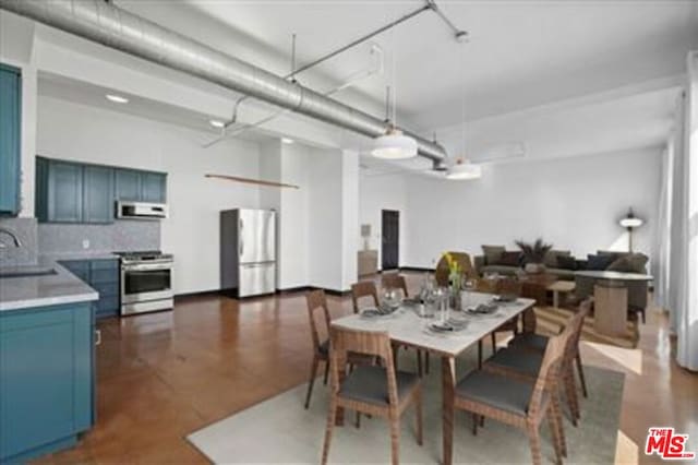 dining area featuring sink