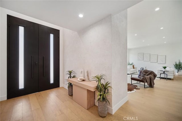 entryway with light wood-type flooring