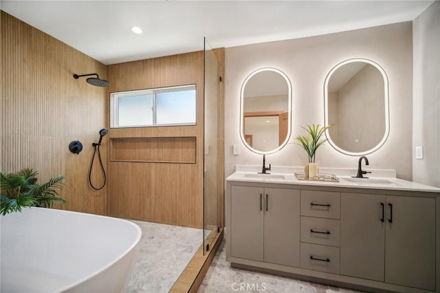 bathroom with plus walk in shower and vanity