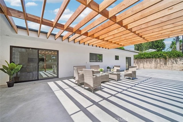 view of patio with an outdoor hangout area and a pergola