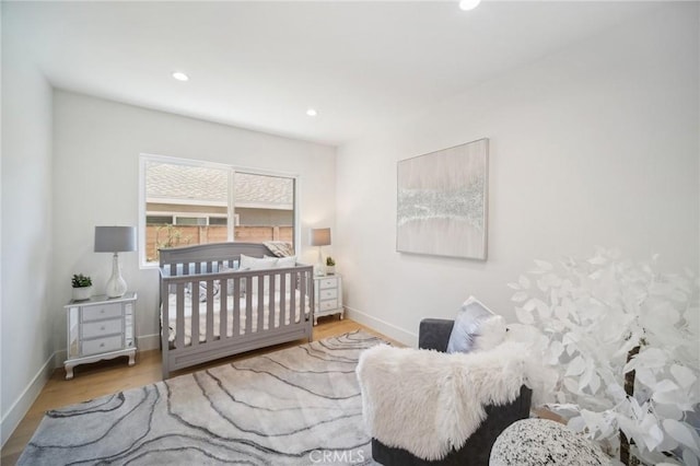 bedroom with light wood-type flooring