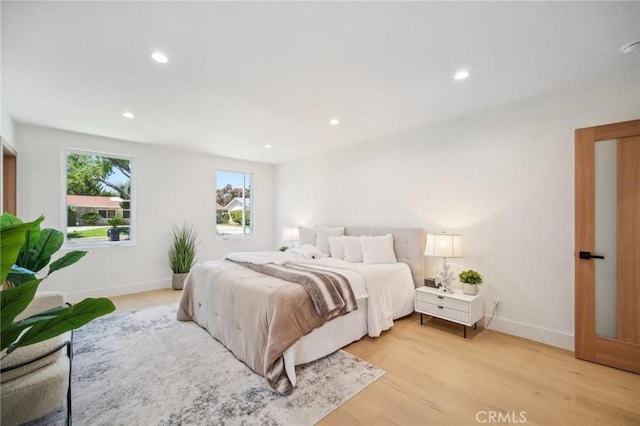 bedroom featuring light hardwood / wood-style floors