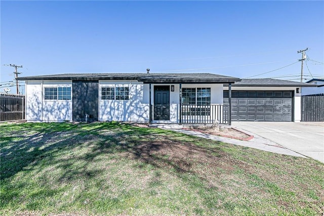 ranch-style home featuring a garage and a front yard