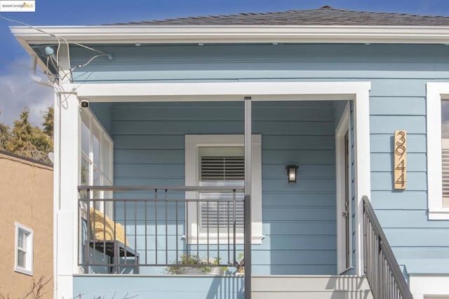 entrance to property with covered porch