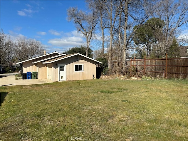 view of home's exterior with a yard