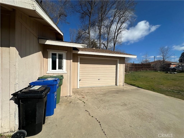 garage with a lawn