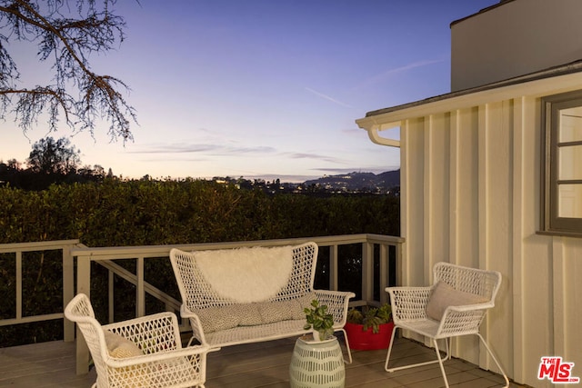 view of deck at dusk