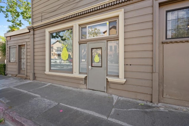 property entrance with a patio area