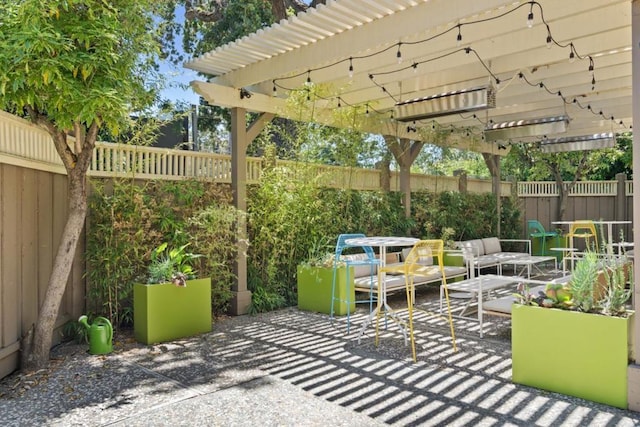 view of patio / terrace featuring an outdoor living space and a pergola