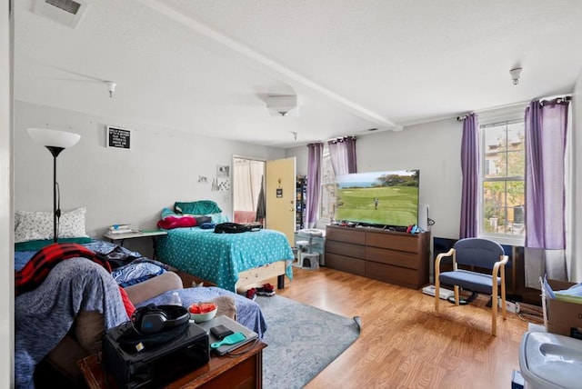 bedroom featuring light hardwood / wood-style floors