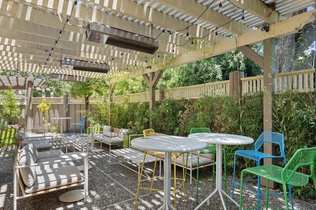 view of patio featuring an outdoor living space and a pergola