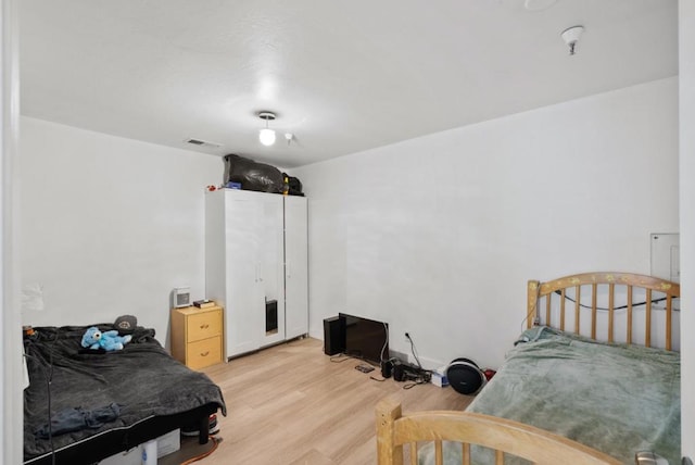 bedroom featuring light hardwood / wood-style floors