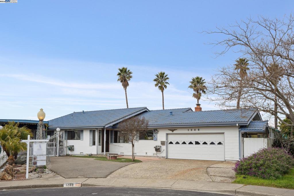 ranch-style home with a garage