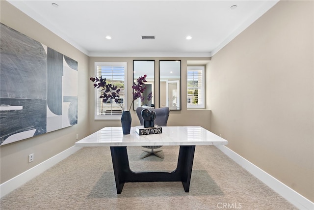 office with crown molding and light colored carpet