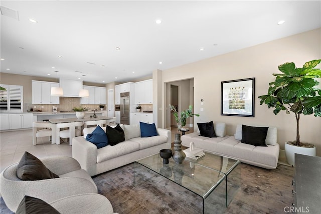 living room with light tile patterned floors