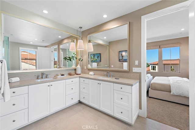 bathroom featuring vanity and tile patterned flooring