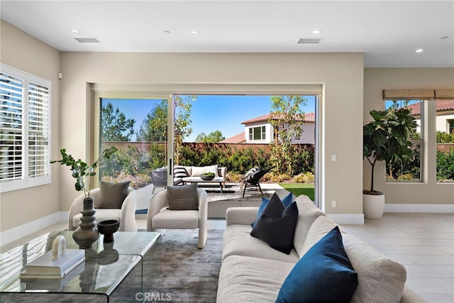 living room with light tile patterned floors