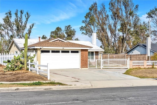 ranch-style house featuring a garage