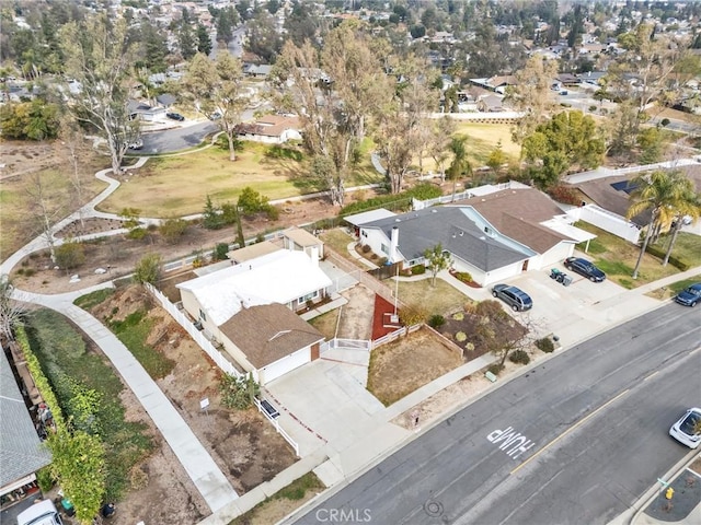 birds eye view of property with a residential view