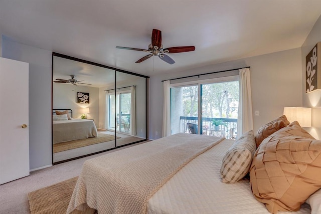 carpeted bedroom featuring ceiling fan and access to exterior