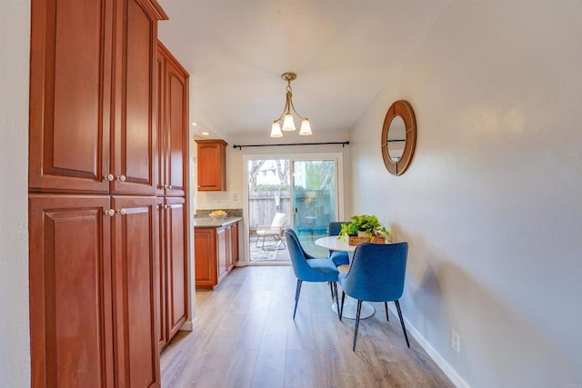 dining area featuring light hardwood / wood-style flooring