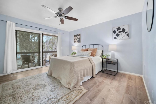 3575 Monair Dr Unit C, San Diego, CA 92117 - bedroom featuring wood finished floors, baseboards, access to outside, and ceiling fan