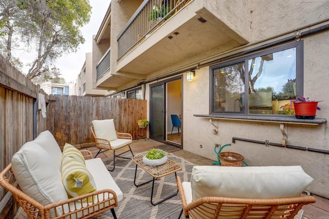 3575 Monair Dr Unit C, San Diego, CA 92117 - fenced backyard with a balcony, an outdoor hangout area, and a patio area