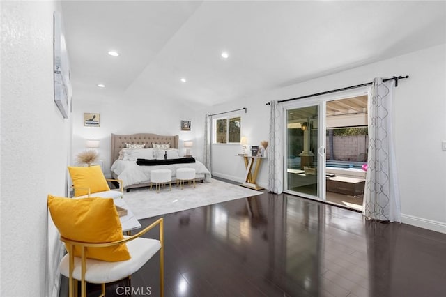 bedroom with access to outside, dark hardwood / wood-style floors, and vaulted ceiling