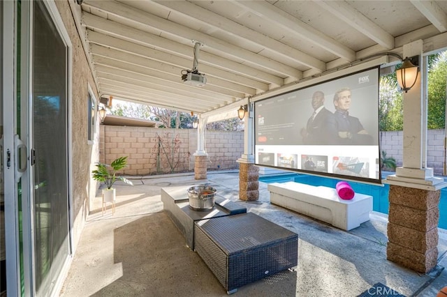 view of patio featuring a fenced in pool