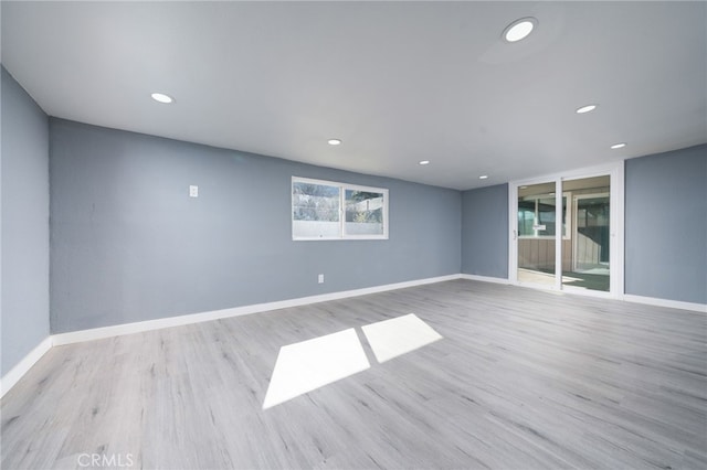 unfurnished room featuring light hardwood / wood-style floors