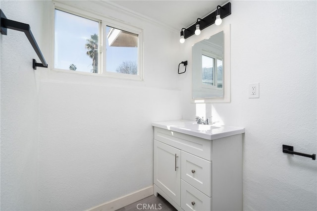 bathroom featuring vanity and plenty of natural light