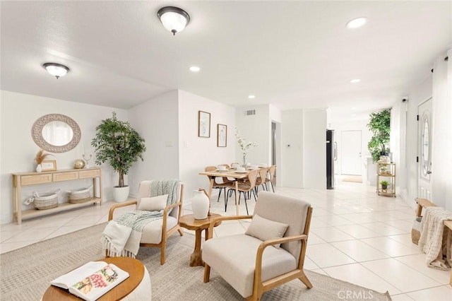 living area featuring light tile patterned floors