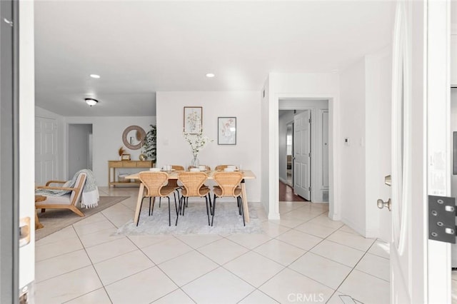 dining room with light tile patterned floors