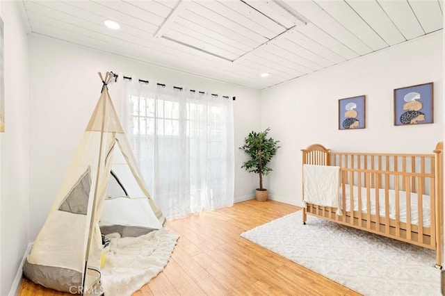 bedroom featuring hardwood / wood-style floors