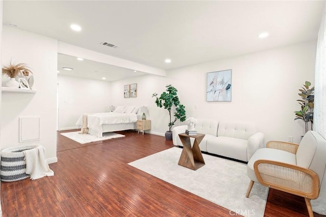 bedroom featuring dark wood-type flooring