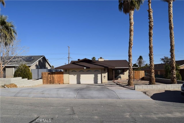 single story home featuring a garage