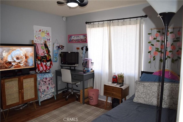 bedroom featuring hardwood / wood-style flooring