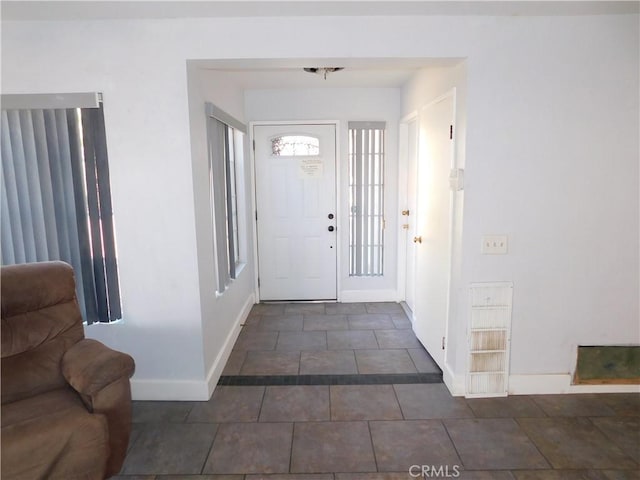 view of tiled foyer entrance