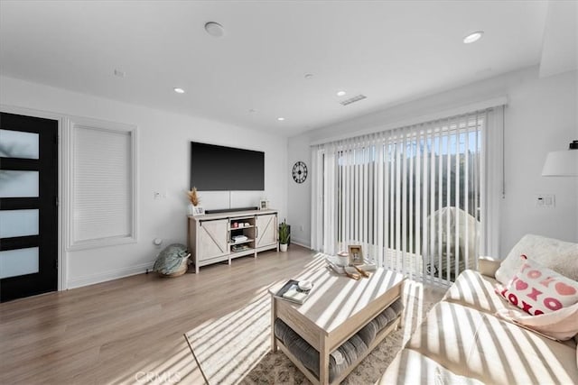 living room with light wood-type flooring